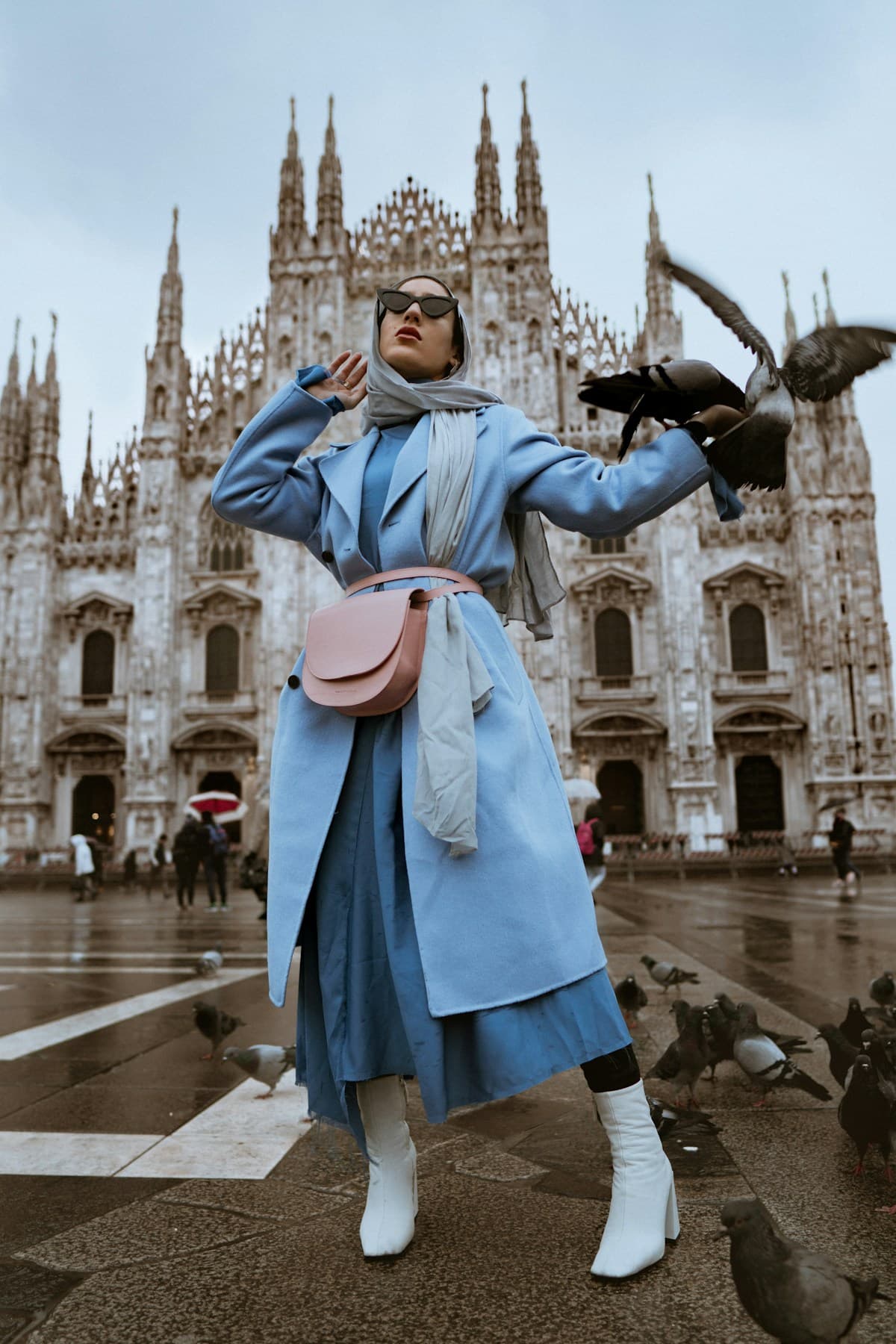 Powder-blue tailoring on a city street